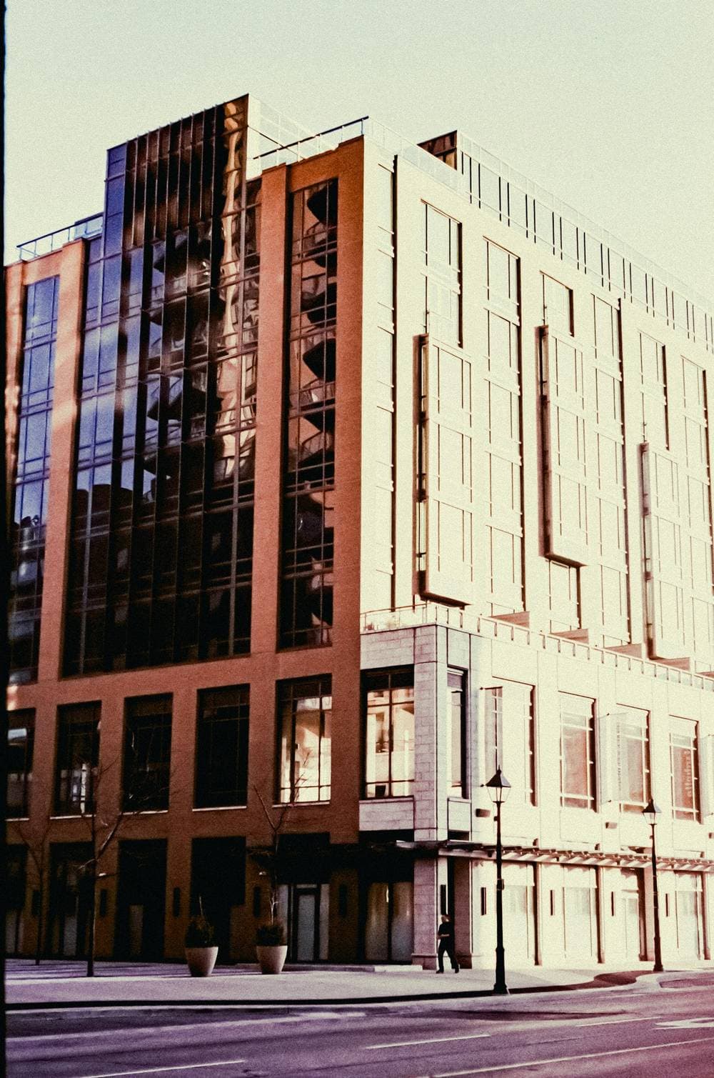 Modern glass and brick office building in daylight